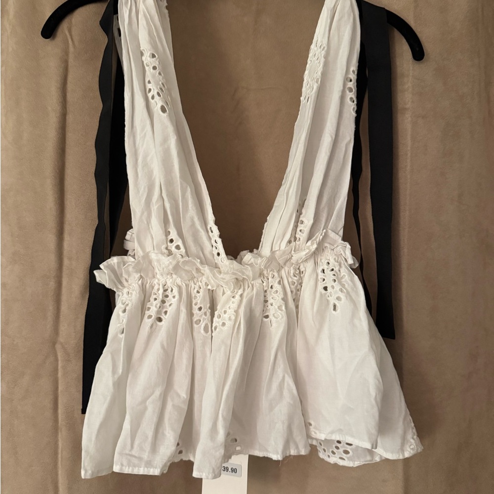 White Sleeveless Ruffled Backless Blouse